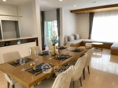 Luxurious dining area with elegant table setting and cozy seating in modern home