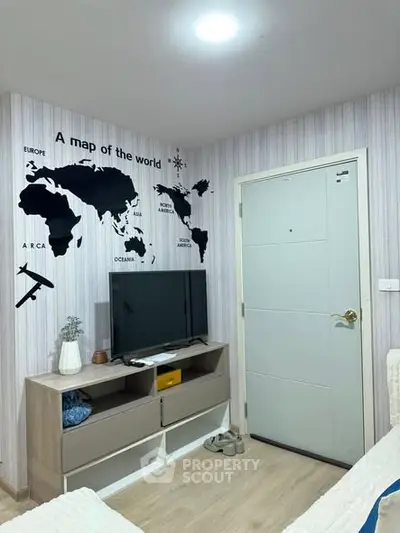 Modern living room with world map wall art and sleek TV stand