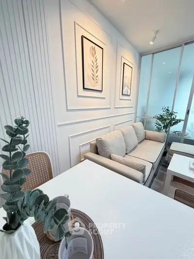 Stylish modern living room with elegant decor and cozy seating in a bright, inviting space.
