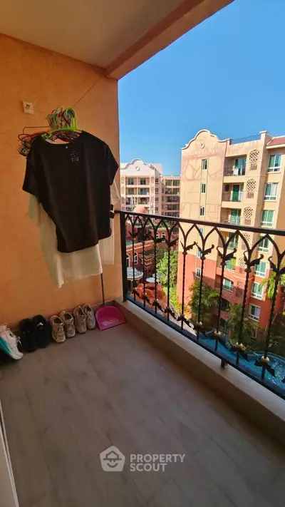 Charming balcony with city view, perfect for relaxation and enjoying the outdoors.