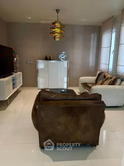 Stylish living room with modern furniture and elegant lighting