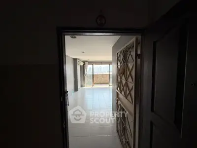 Spacious apartment entrance with city view balcony