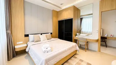 Luxurious modern bedroom with elegant wood paneling and stylish decor