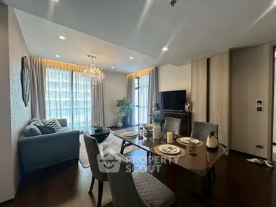 Luxurious living room with elegant dining area and modern decor in high-rise apartment.