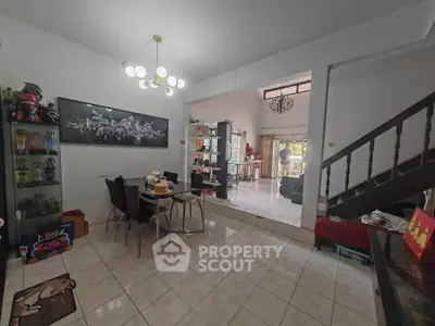 Spacious living area with modern decor and open layout, perfect for family gatherings.