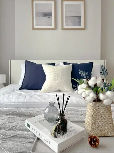 Elegant bedroom with stylish decor and cozy bedding, perfect for relaxation and comfort.