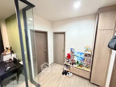 Modern interior with glass partition and stylish storage solutions