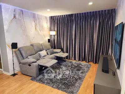 Luxurious living room with plush seating and elegant decor