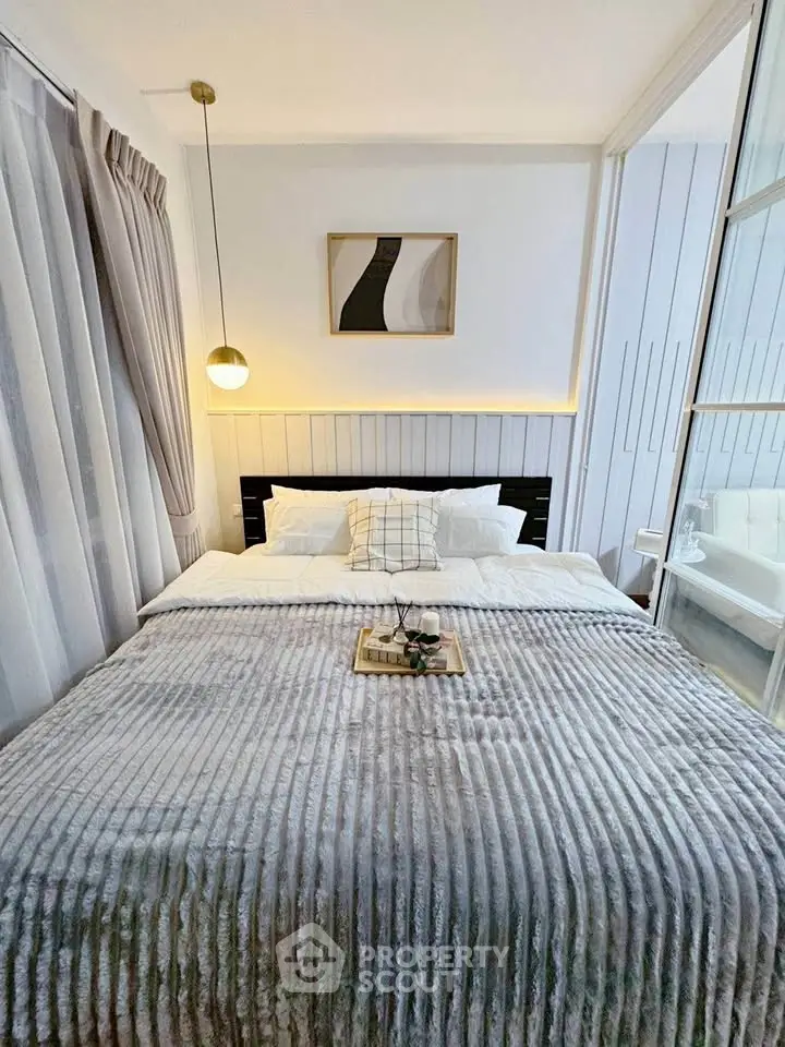 Cozy modern bedroom with stylish decor and soft lighting