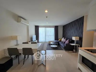 Spacious modern living room with stylish decor and open layout, perfect for relaxation and entertainment.