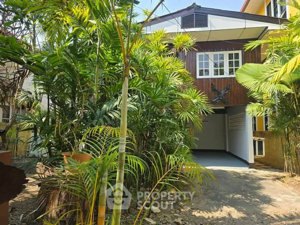 Charming tropical home with lush garden and unique architectural design
