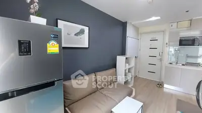 Modern apartment interior with sleek kitchen and cozy living area