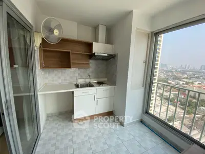 Modern compact kitchen with city view and open layout