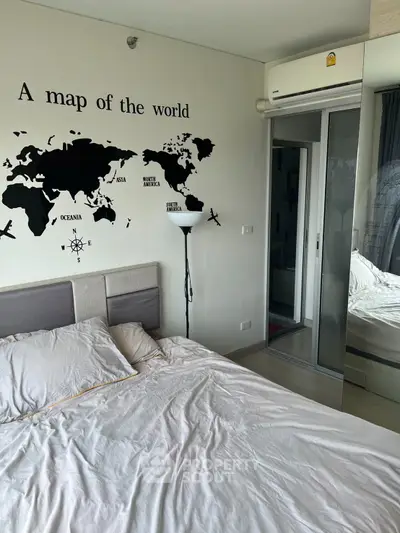 Modern bedroom with world map wall art and mirrored closet doors