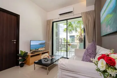 Modern living room with balcony view, featuring stylish decor and natural light.
