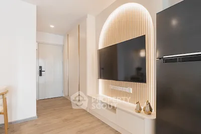 Modern living room with sleek TV setup and stylish decor