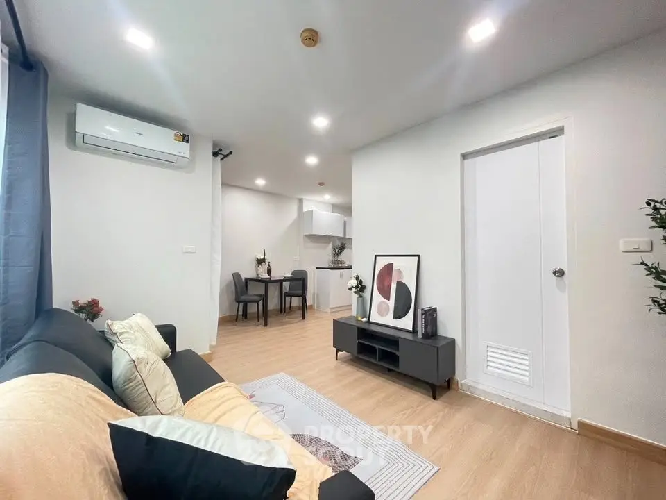 Modern living room with cozy seating and stylish decor