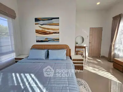 Bright and modern bedroom with stylish decor and natural light