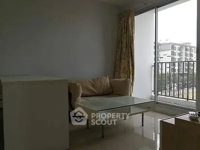 Modern living room with balcony view in urban apartment