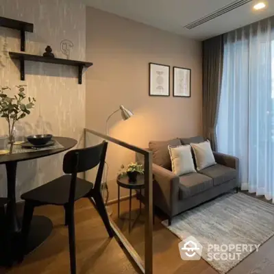 Cozy and modern living space with comfortable sofa, chic dining area, elegant decor, and soft lighting, perfect for urban living.