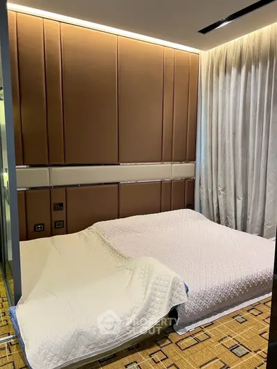 Luxurious bedroom with elegant decor and cozy bedding