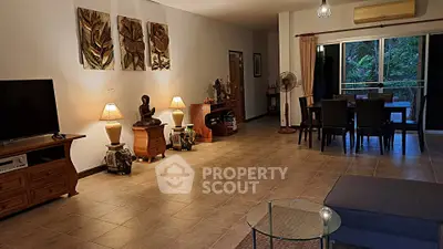 Spacious living room with elegant decor and garden view