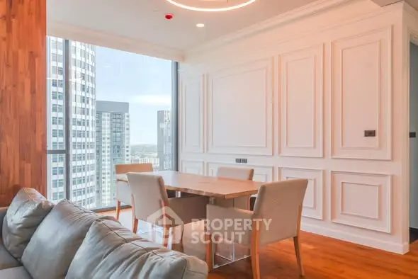 Luxurious modern living room with elegant dining area and stunning city view.