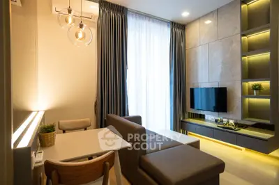 Modern living room with stylish lighting and sleek furniture