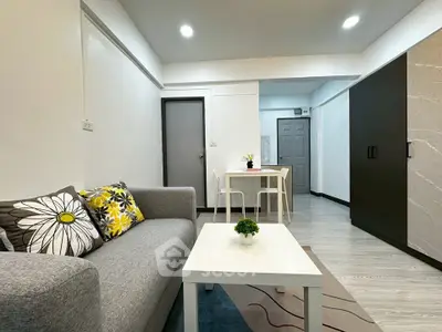 Modern living room with stylish decor and cozy seating area