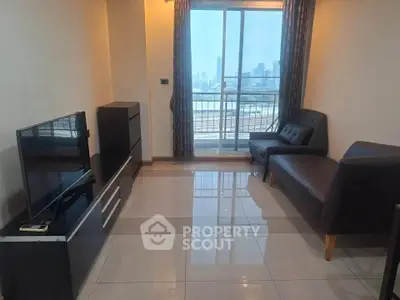 Modern living room with city view and sleek furniture