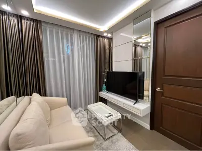 Modern living room with sleek TV setup and elegant decor