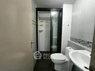 Modern bathroom with sleek design and glass shower enclosure