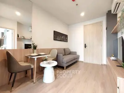 Modern living room with stylish decor and cozy seating area