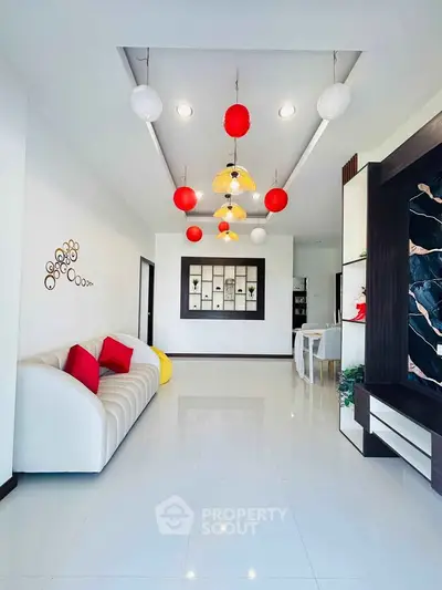 Elegant modern living room with stylish lighting and sleek white flooring