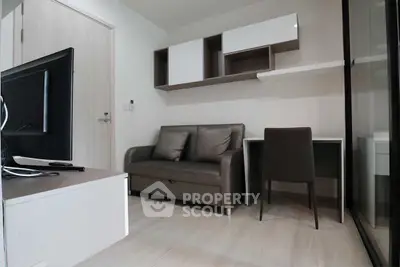 Modern living room with sleek furniture and minimalist design, perfect for urban living.