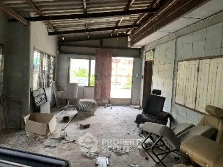 Spacious fixer-upper with potential, featuring open layout and ample natural light.