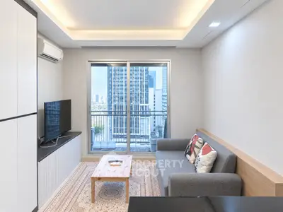 Modern living room with city view and stylish furniture