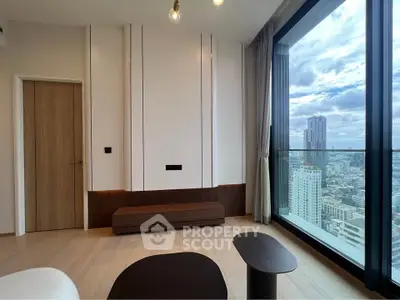 Modern living room with floor-to-ceiling windows offering stunning city views, featuring sleek minimalist design.