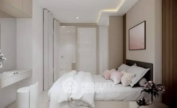 Elegant bedroom with modern decor and soft lighting, featuring a cozy bed and stylish furnishings.