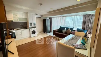 Spacious modern living room with open kitchen and large windows