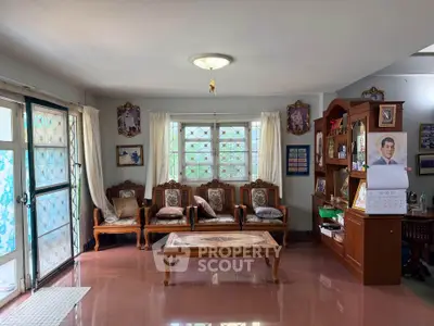 Charming living room with classic wooden furniture and natural light