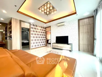 Spacious modern living room with elegant lighting and stylish decor