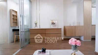 Modern interior with wooden furniture and elegant decor in a stylish living space.