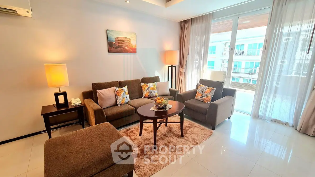 Spacious living room with modern decor and natural light in a stylish apartment.