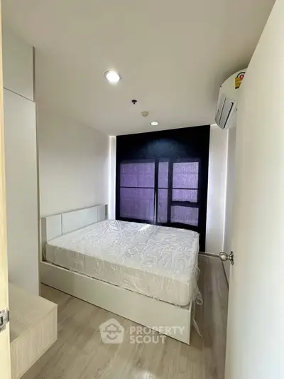 Modern bedroom with minimalist design and natural light