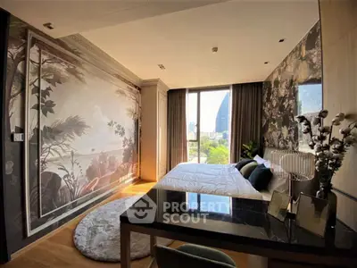 Luxurious bedroom with stunning wall art and city view, featuring elegant decor and natural light.