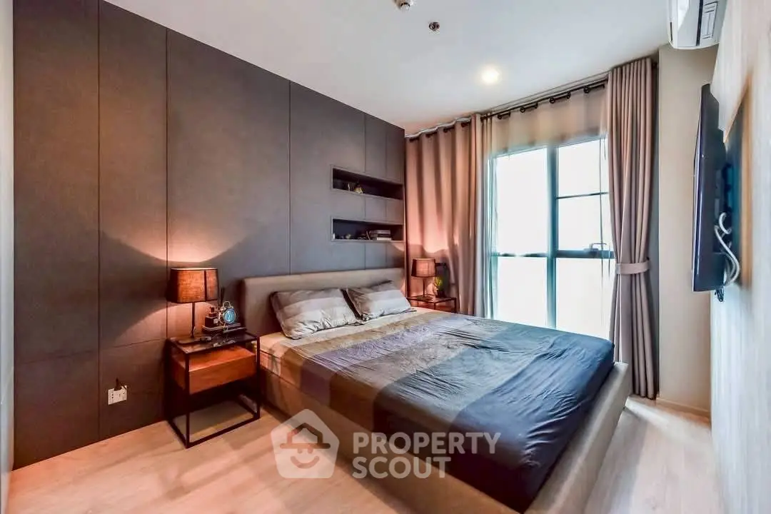 Modern bedroom with stylish decor and natural lighting