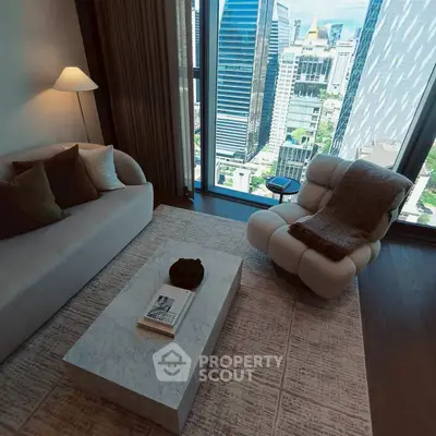 Luxurious living room with modern furniture and stunning city view from high-rise apartment.