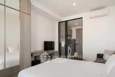 Modern studio apartment with sleek design and in-unit laundry