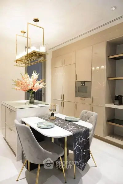 Luxurious modern kitchen with elegant dining setup and sleek cabinetry